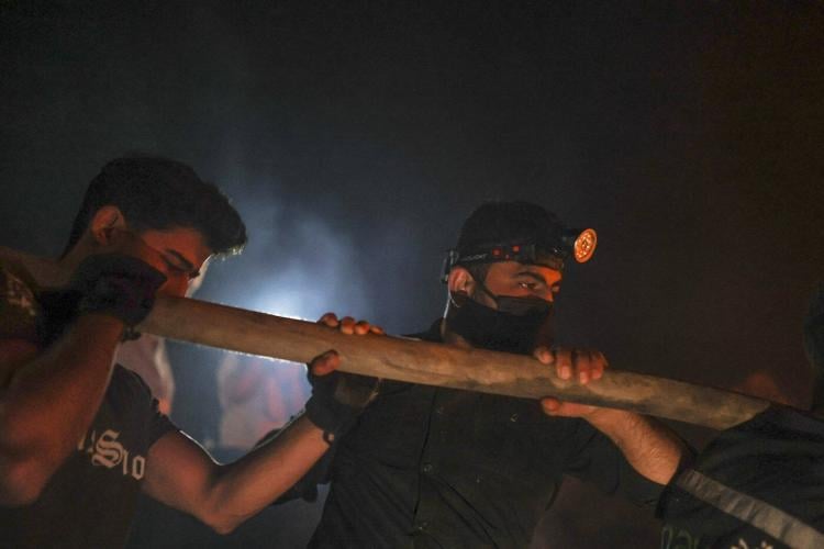 Photos of Syrian firefighters struggling with weeklong fires