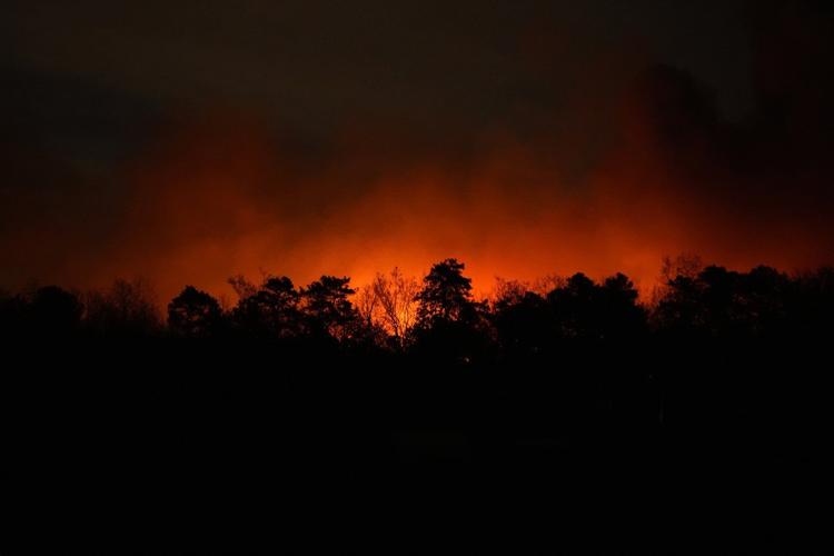 Evacuation orders lifted as fast-moving New Jersey wildfire burns