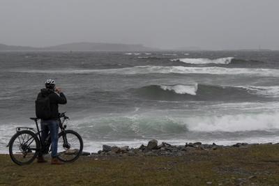 Tens of thousands lose power after windstorm lashes East Coast