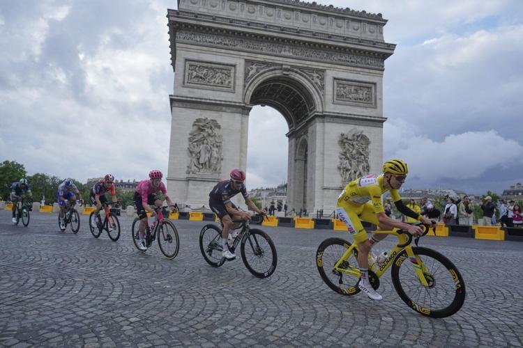 Slovenian rider Tadej Pogačar wins the Tour de France for the fourth time