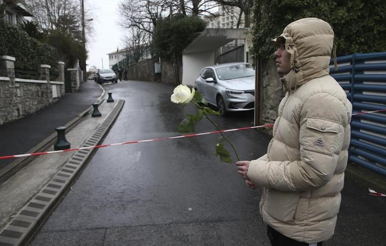 French high school student held for teacher's fatal stabbing