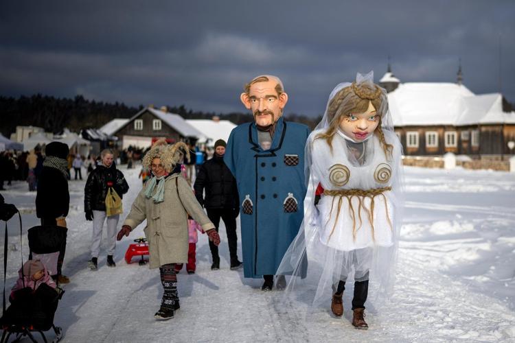 Photos show masked revelers celebrating Shrovetide in Lithuania