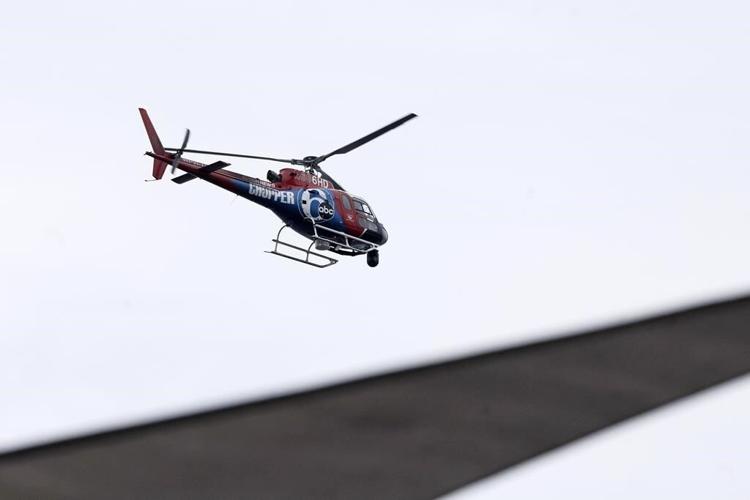 Probe: Doomed Philadelphia news helicopter hit trees fast, broke up, then burned, killing 2 on board