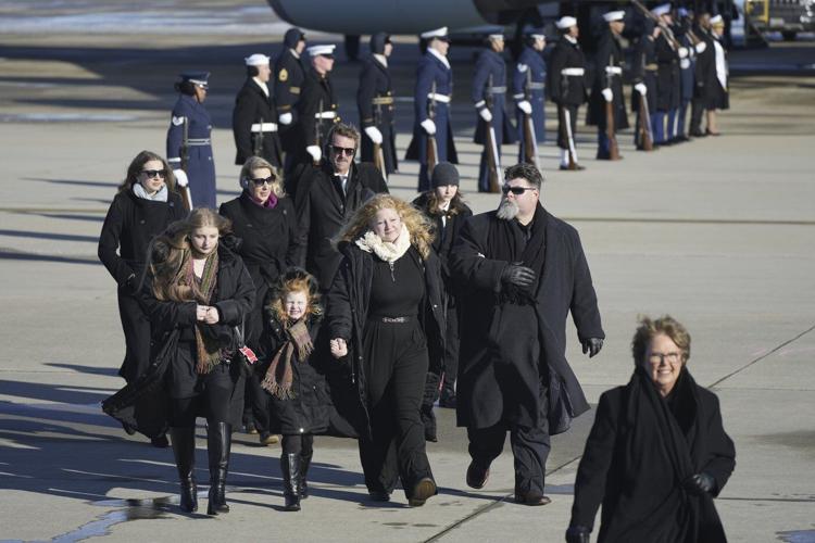 Jimmy Carter's casket arrives at the US Capitol, where he will lie in state