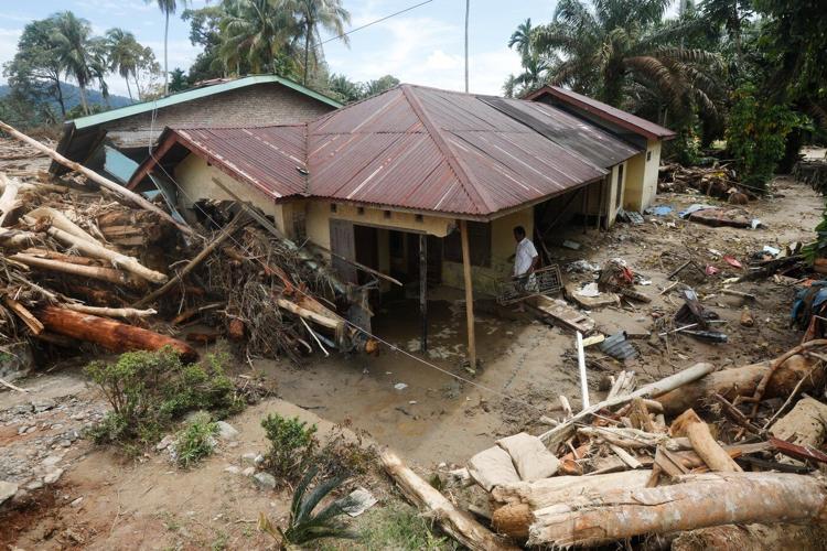 Deadly Asian floods are no fluke. They’re a climate warning, scientists say