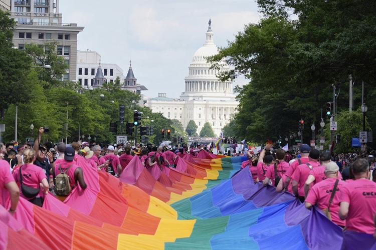AP PHOTOS: World Pride gathers LGBTQ+ advocates in Washington for 50th anniversary