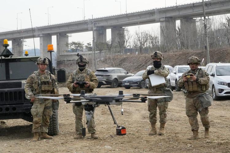 North Korean leader Kim observes test of rocket launch systems with his daughter