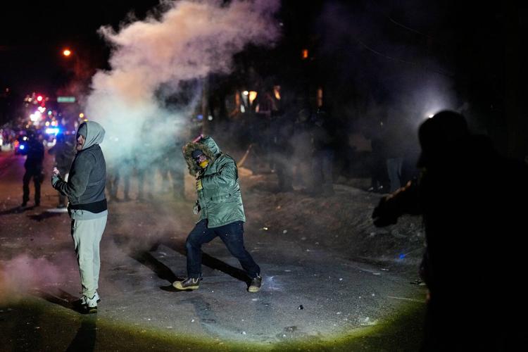 Photos of tensions between federal officers and locals in Minneapolis
