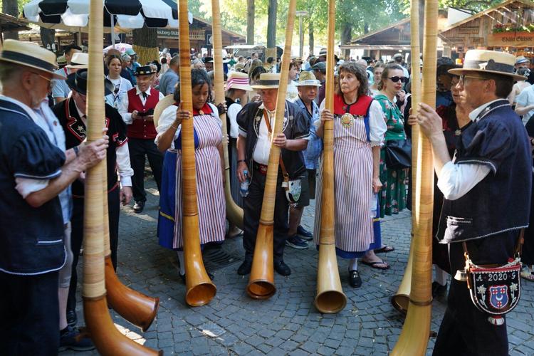 Heat forces yodelers at annual Swiss festival to sing in fountains