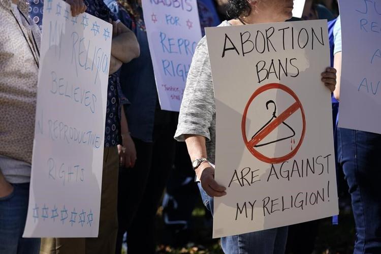 Abortion supporters win in conservative, liberal states