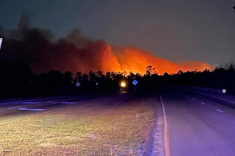 Lighter winds help crews fighting wildfires in South and North Carolina