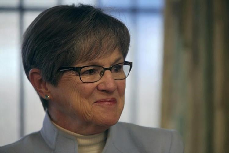 Governor decries 'distracting' Kansas with 'wedge issues'