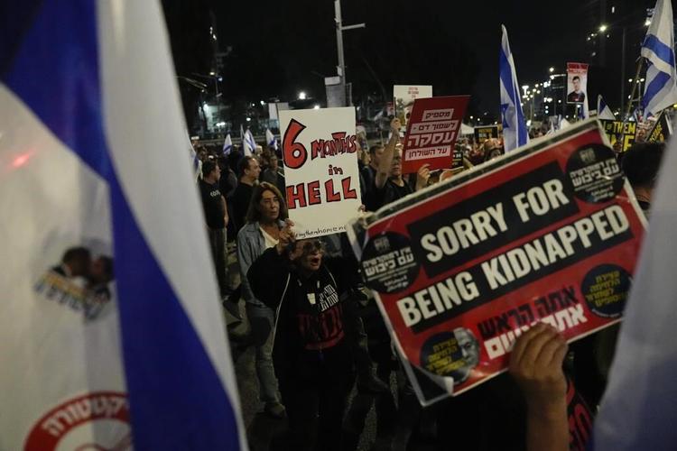 Israel finds the body of a hostage killed in Gaza, while talks will resume on a cease-fire