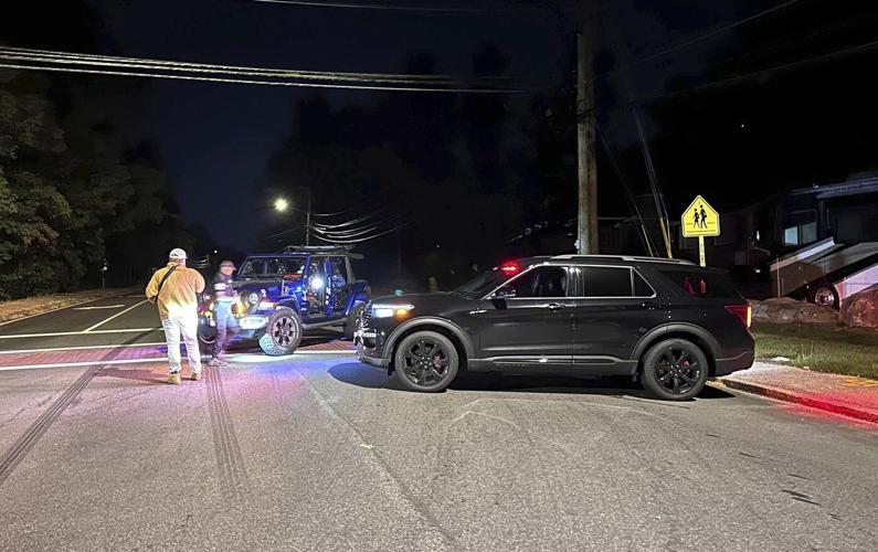 New Hampshire police say multiple gunshot victims at country club. 1 suspect in custody