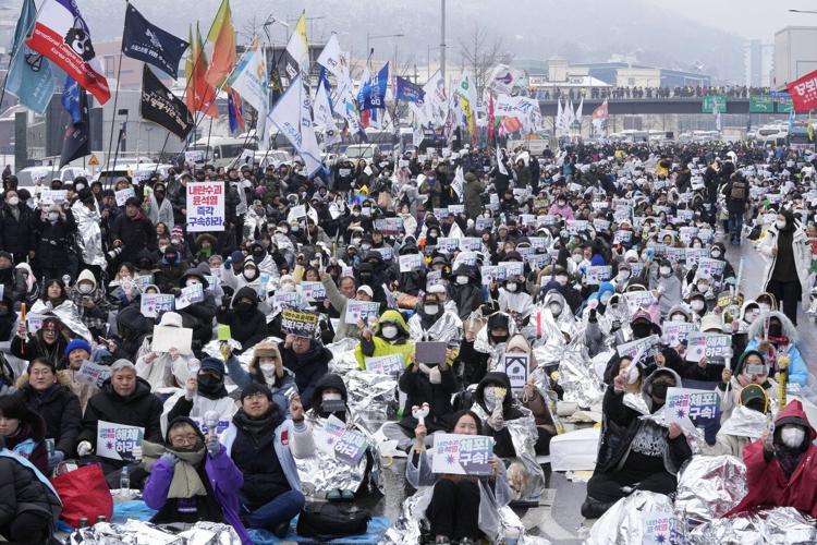 South Korean anti-corruption agency asks police to take over efforts to detain impeached Yoon