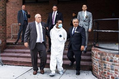 Personal assistant convicted of dismembering his boss is sentenced to 40 years to life