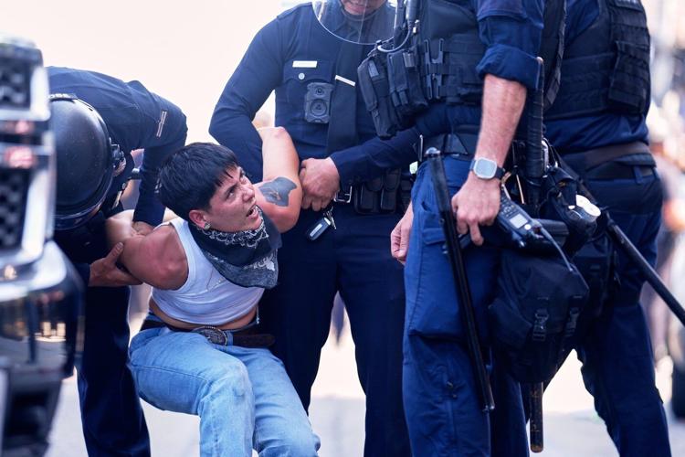 AP PHOTOS: Protesters clash with law enforcement in Los Angeles