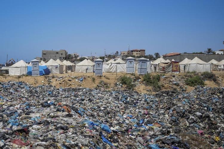 In the searing heat of the Gaza summer, Palestinians are surrounded by sewage and garbage