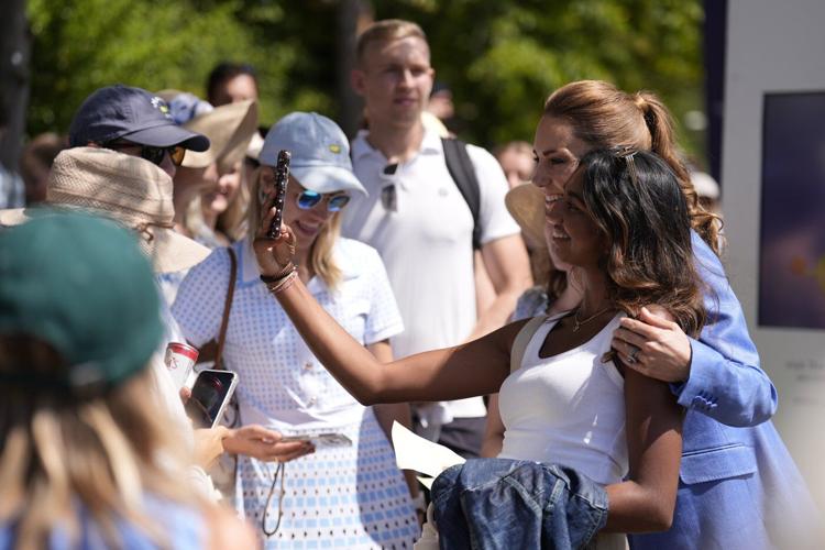 Princess Kate returns to Wimbledon and greets tennis fans lining up in the Queue