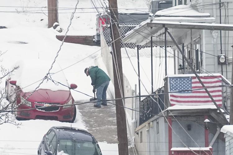 Winter's first big snowstorm hits the Northeast as schools close and traffic slows