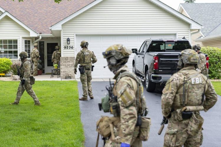 Photos show arrest of suspect in the shooting of lawmakers in Minnesota following a huge search