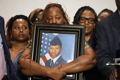 Lawsuit filed over Florida deputy's shooting of US airman who was killed in his own home