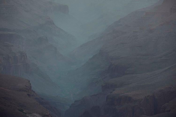 Fire crews along Grand Canyon are trying to save cabins after loss of historic lodge