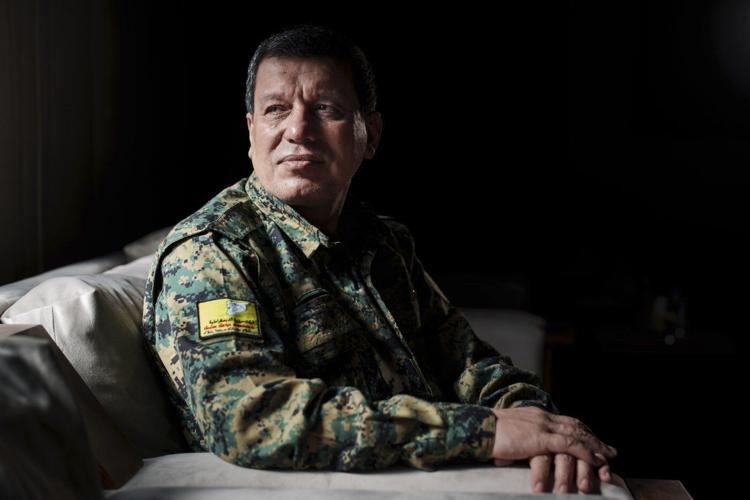 US-backed commander says his Kurdish-led group wants a secular and civil state in post-Assad Syria