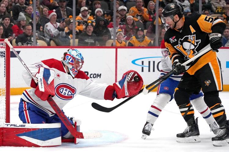 Crosby breaks Lemieux's scoring record, Penguins beat Canadiens 4-3 in shootout