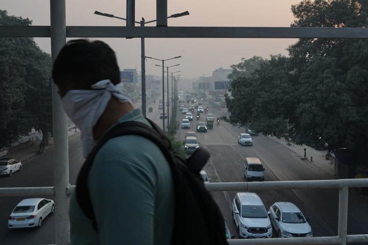 Photos show the daily struggle to breathe in New Delhi's dense winter smog