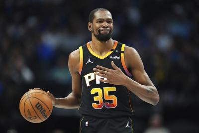 Kevin Durant is going from the Suns to the Rockets in a blockbuster trade, AP source says