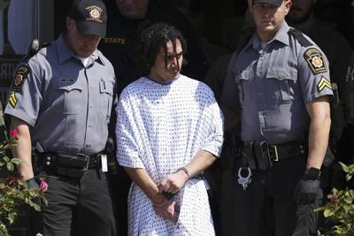 Escaped murderer charged with burglary and theft while on the run for 2 weeks