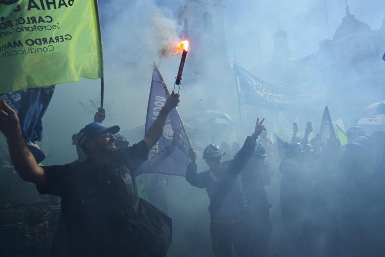 Workers around the world demonstrate on May Day, in photos