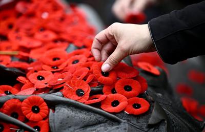 The Latest: Prime minister marks Remembrance Day ahead of national ceremony