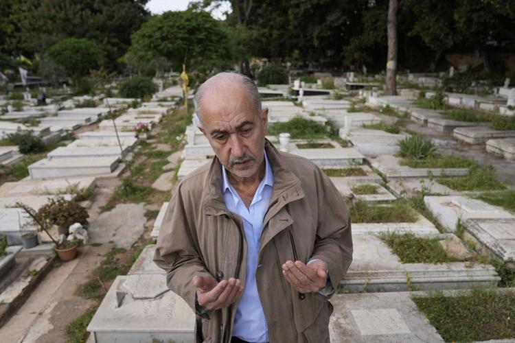 50 years after Lebanon's civil war began, a bullet-riddled bus stands as a reminder