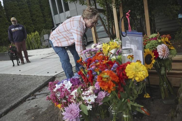 Suspect charged with murder and animal cruelty in fatal carjacking of 80-year-old dog walker