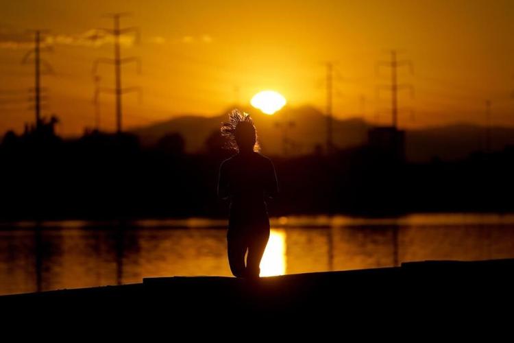 Biden looks to provide relief from extreme heat as record temperatures persist