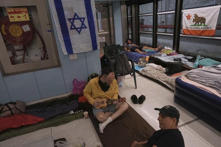 Israelis shelter from missiles during escalating Iran-Israel conflict in photos