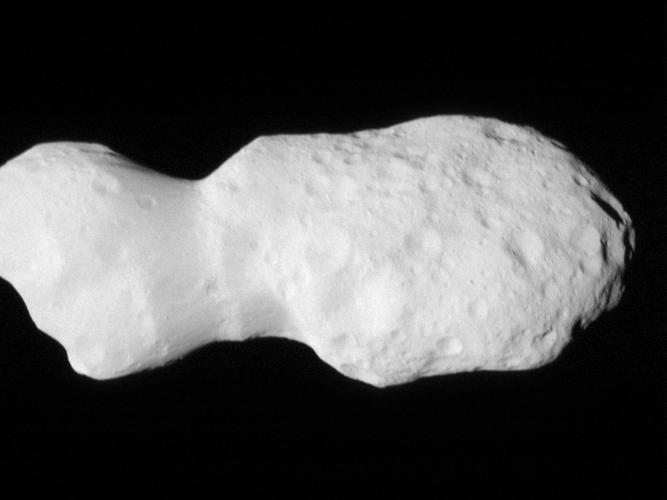 NASA's Lucy spacecraft beams back pictures of an asteroid shaped like a lumpy bowling pin