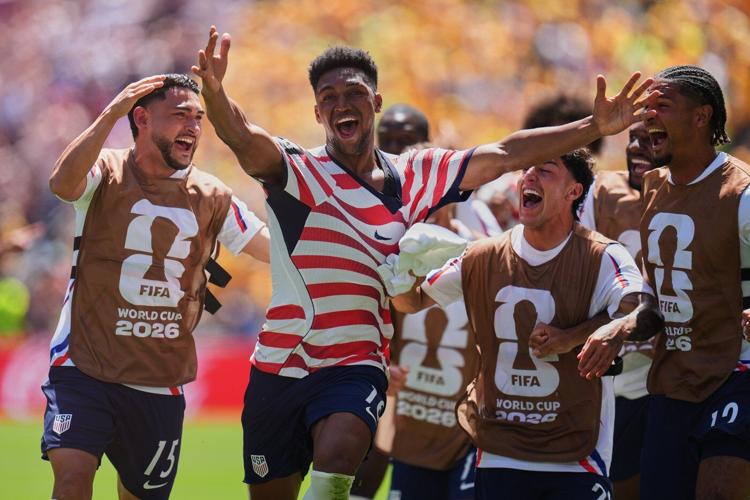 US reaches World Cup knockout round and wins its group with 2nd straight victory, 2-0 over Australia
