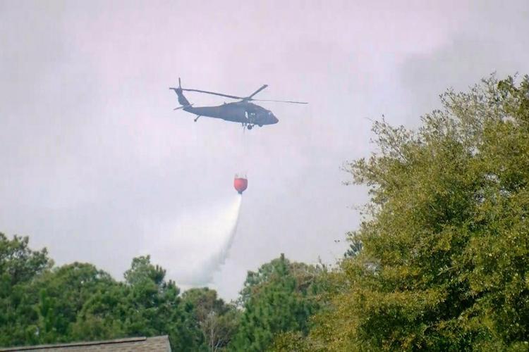 Lighter winds help crews fighting wildfires in South and North Carolina