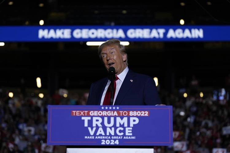 Election 2024 Latest: With 1 week to go, Harris heads to Washington and Trump stumps in Pennsylvania