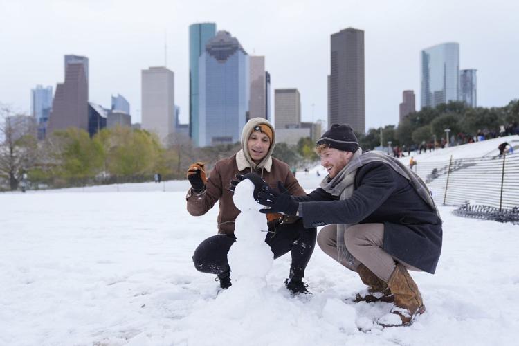 Winter storm that dropped record-breaking snow in New Orleans spreads into Florida and the Carolinas
