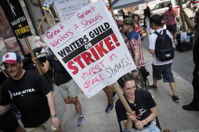 AI is the wild card in Hollywood's strikes. Here's an explanation of its unsettling role