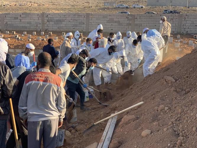 Searchers look for more than 10,000 missing in flooded Libyan city where death toll eclipsed 11,000