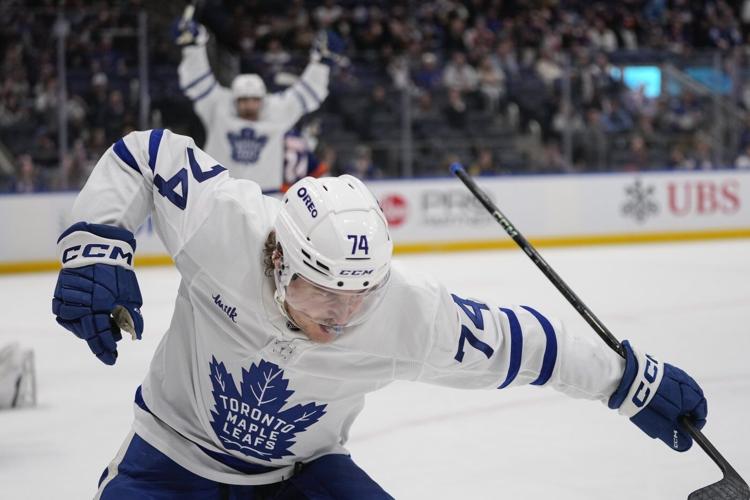 McMann, Woll lead Maple Leafs to 2-1 win over Islanders