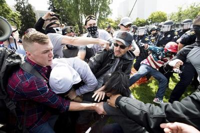 Charges against alleged white supremacists are tossed by a California judge for the second time