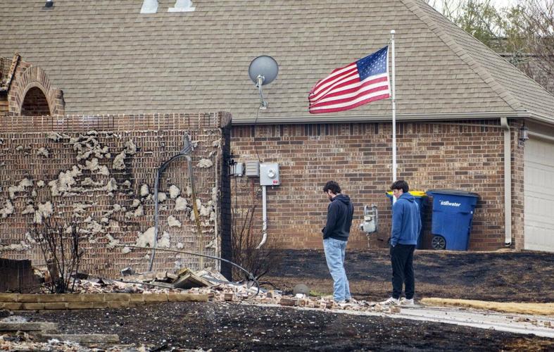 Residents pick up the pieces after devastating storms scour the US South and Midwest