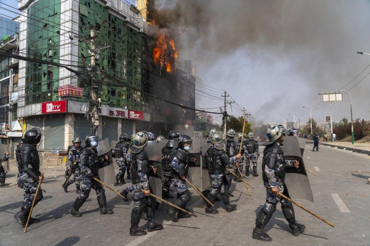 At least 2 dead in Nepal after pro-monarchy supporters clash with police during rally