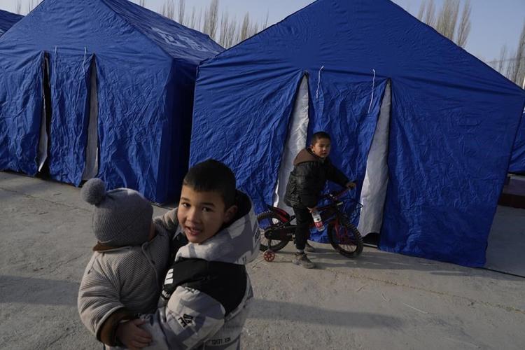 Thousands still shelter in freezing weather after 7.1 quake in western China killed key livestock